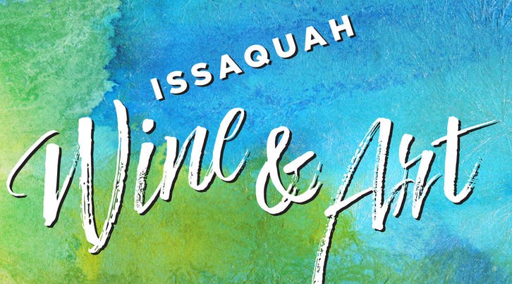 Attendees enjoy the vibrant summer atmosphere at Issaquah's Wine and Art Walk.